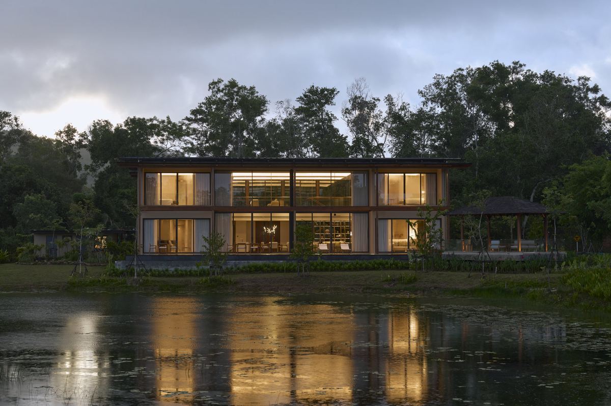 Lakefront villa in Thalang at dusk